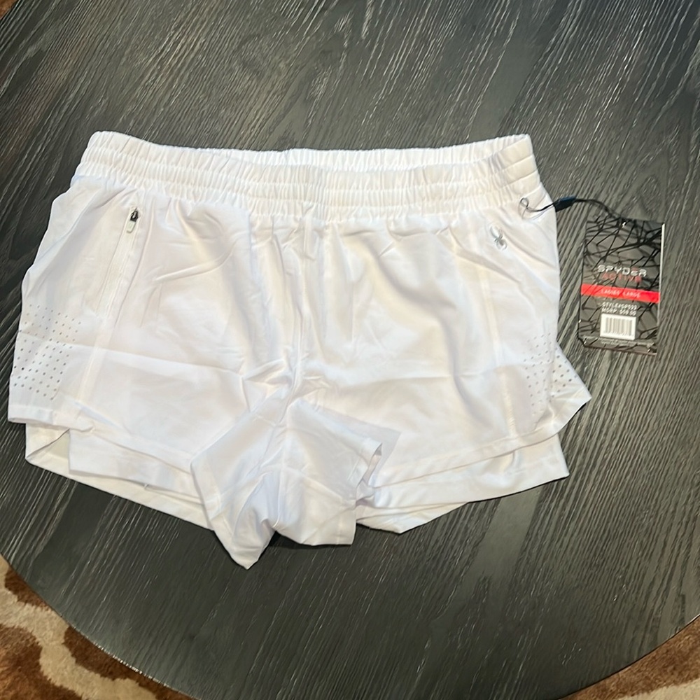 Spyder active shorts. Women’s size large. Brand new